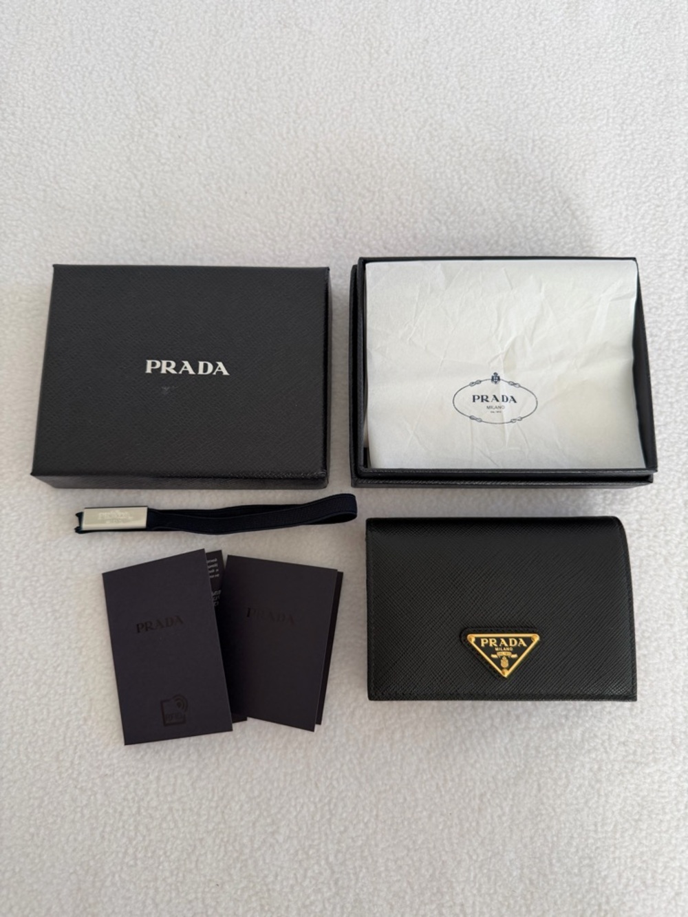 Prada Black Saffiano Leather small wallet with Gold Triangle Plaque